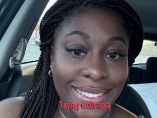 Toying_with_toya
